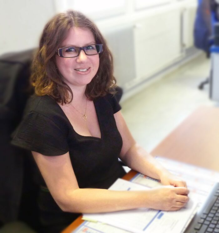Tatiana Koscinzuck, Sales administrative assistant at her desk